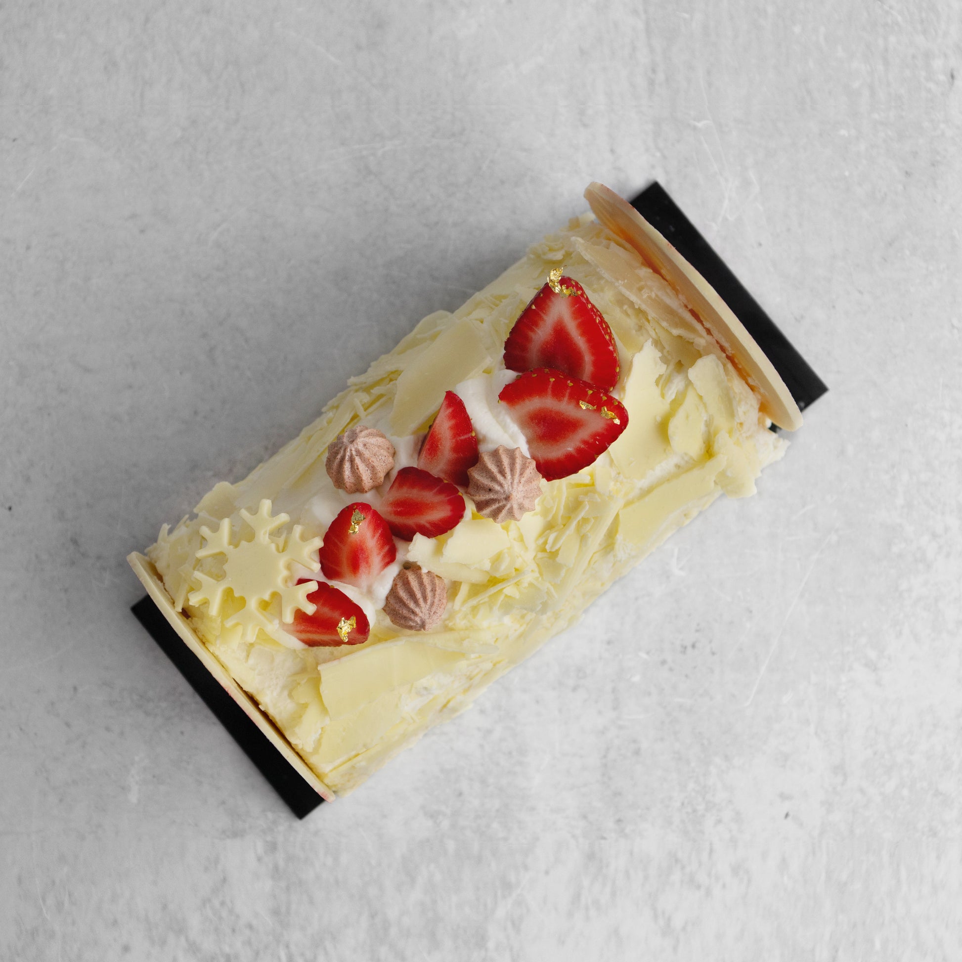 Top view of white Bûche de Noël